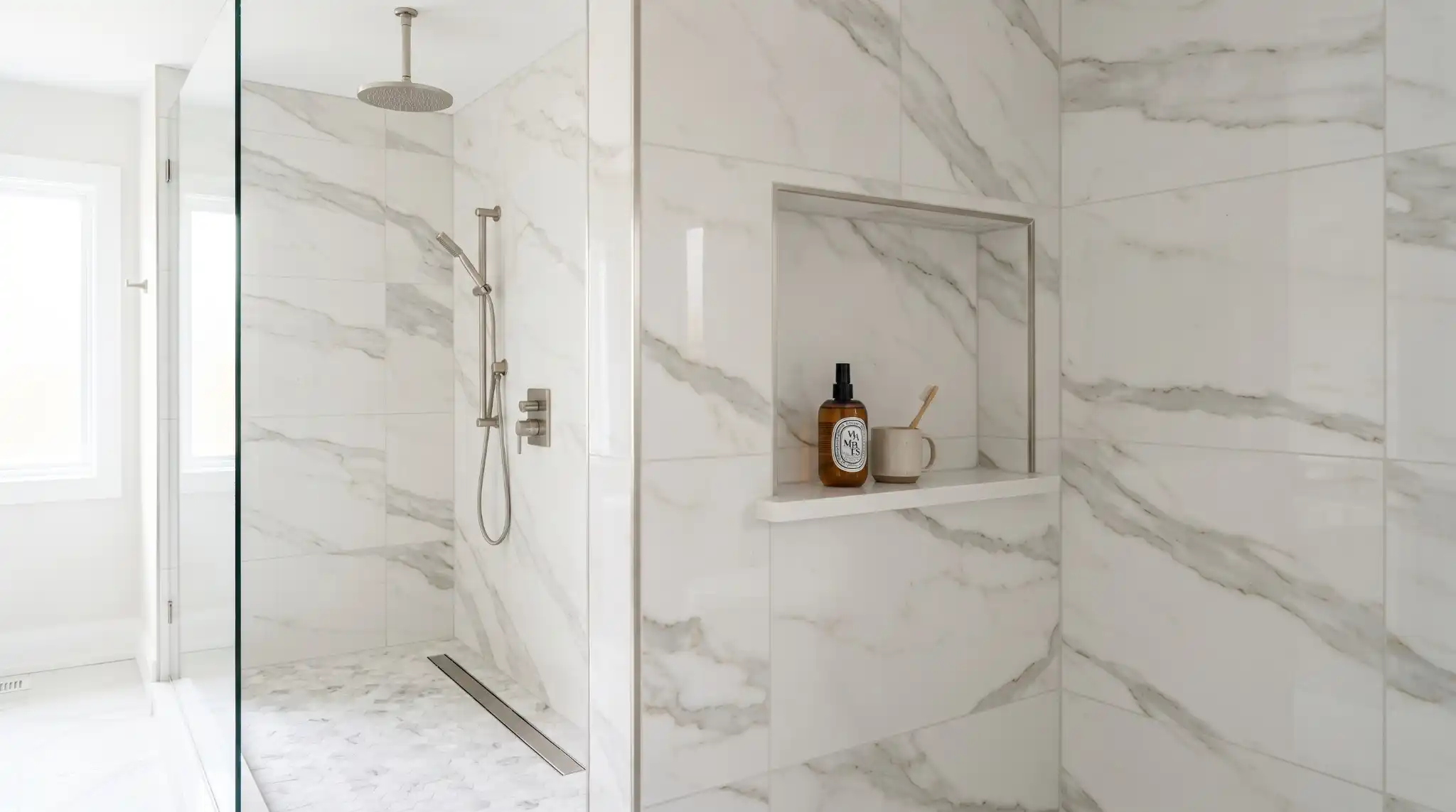 Marble-look tile bathroom shower installation